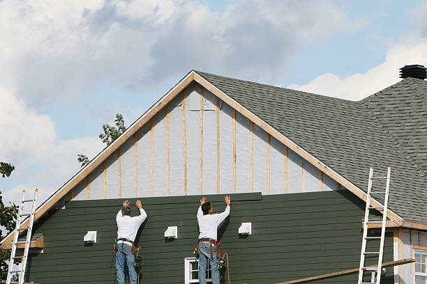 Professional Siding technician working in Fort Bragg, NC